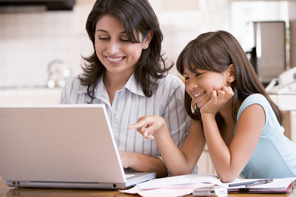 Mom and Daughter looking at computer